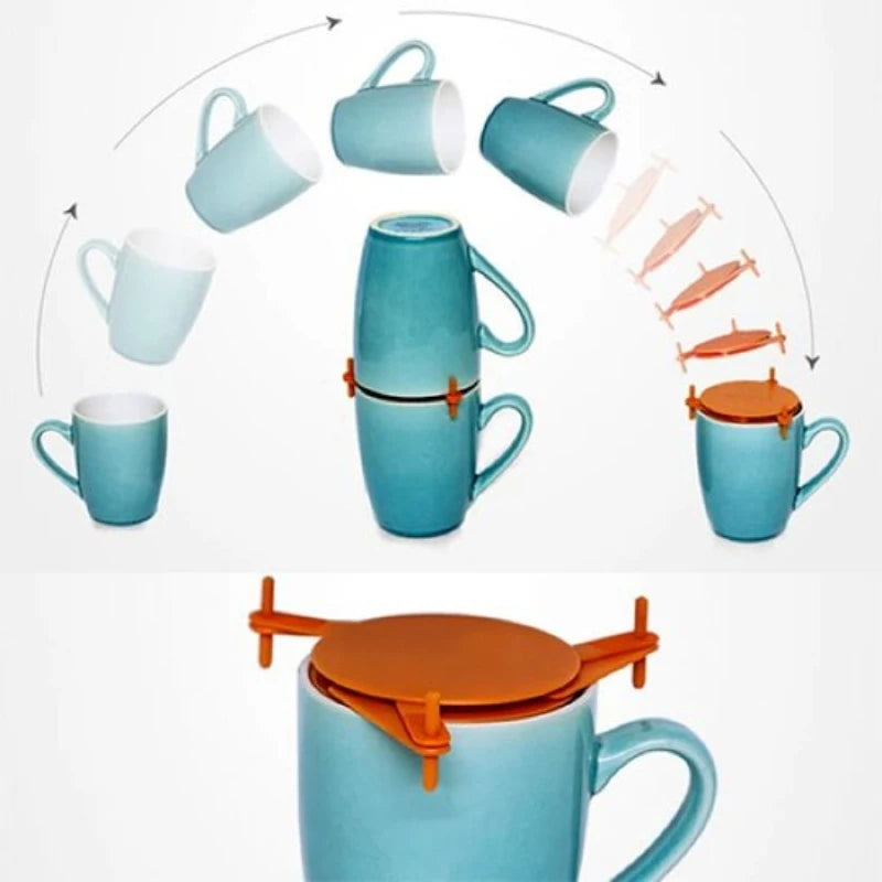 Turquoise mug with orange lid and handle attachment on a white background
