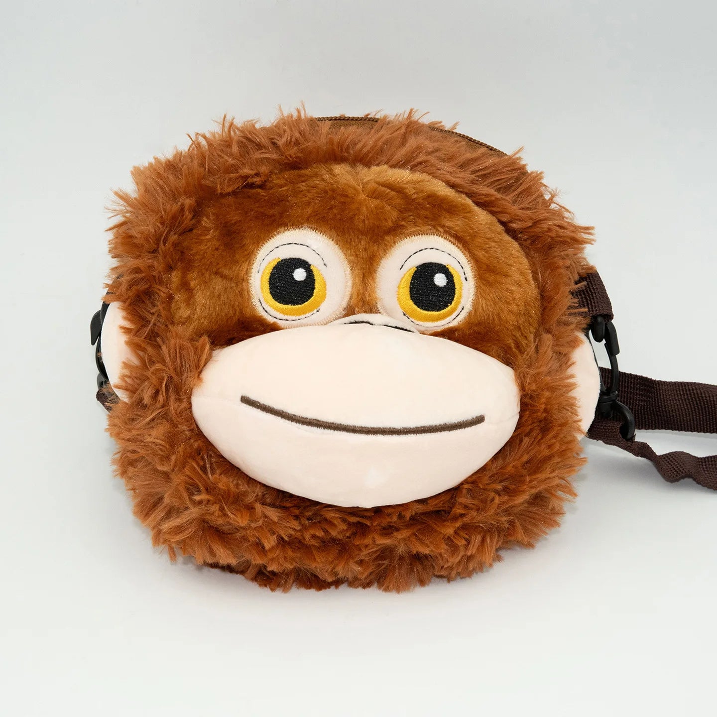 Plush monkey bag with a white background