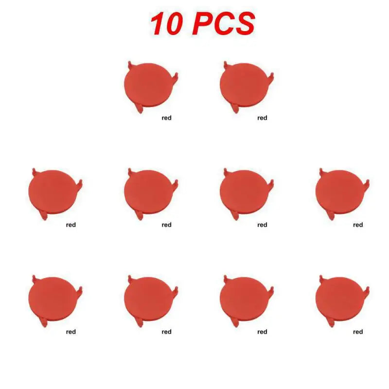 Red circular objects with small horns arranged in a grid on a white background